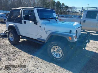 2005 Jeep Wrangler Unlimited with VIN 1J4FA44SX5P316055, listed as a IAAI auction lot 41586898 with 218,181 mi miles. Bid and sale history available at carsss.com. Image 1.