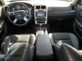 2008 Dodge Charger SRT-8 with VIN 2B3KA73W48H284076, listed as a Copart auction lot 48109825 with 156,174 mi miles and Salvage Title. Bid and sale history available at carsss.com. Image 8.