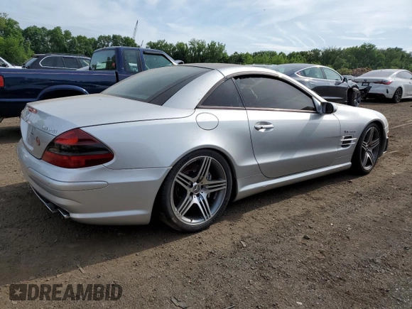 2005 Mercedes-Benz SL z VIN WDBSK79F05F094158, wystawiony jako Copart lot #60888905 z przebiegiem Nie podano mil oraz Szkoda całkowita • Salvage title. Historia ofert i sprzedaży dostępna na DreamBid. Obrazek 3.