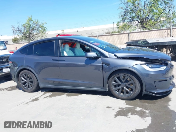 2022 Tesla Model X with VIN 7SAXCAE59NF360301, listed as a IAAI auction lot 41945059 with Not Provided miles and . Bid and sale history available at DreamBid. Image 13.