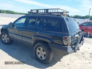 2004 Jeep Grand Cherokee Laredo z VIN 1J4GX48S04C281660, wystawiony jako IAAI lot #42551161 z przebiegiem 173 209 mil mil oraz . Historia ofert i sprzedaży dostępna na DreamBid. Obrazek 3.