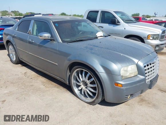 2006 Chrysler 300 Touring with VIN 2C3KA53G06H172162, listed as a IAAI auction lot 42005963 with 209,549 mi miles. Bid and sale history available at carsss.com. Image 1.