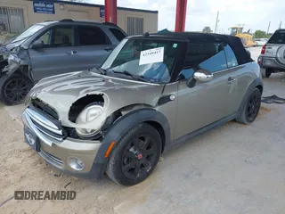 2010 MINI Convertible with VIN WMWMR3C52ATU97825, listed as a IAAI auction lot 42349417 with 64,045 mi miles and . Bid and sale history available at DreamBid. Image 17.