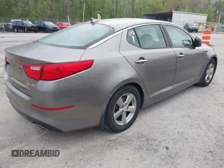 2014 Kia Optima LX with VIN 5XXGM4A73EG277964, listed as a IAAI auction lot 42079663 with 91,009 mi miles. Bid and sale history available at carsss.com. Image 4.