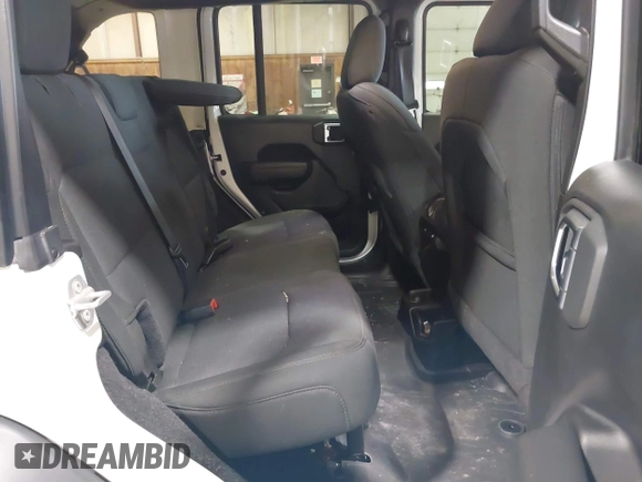 2023 Jeep Wrangler Sport S with VIN 1C4HJXDN2PW632584, listed as a IAAI auction lot 41965191 with 20,288 mi miles and . Bid and sale history available at DreamBid. Image 8.