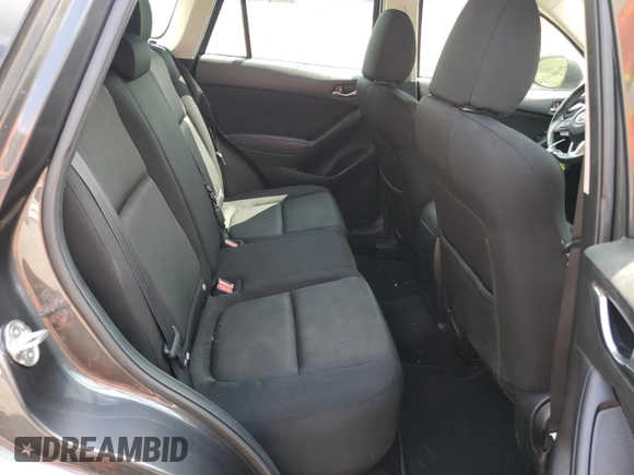 2016 Mazda CX-5 Sport z VIN JM3KE2BY4G0632946, wystawiony jako Copart lot #61447435 z przebiegiem 178 492 mil mil oraz Szkoda całkowita • Salvage title. Historia ofert i sprzedaży dostępna na DreamBid. Obrazek 11.