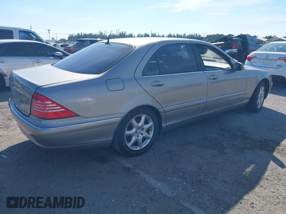 2004 Mercedes-Benz S-Class 4.3L with VIN WDBNG83J14A406775, listed as a IAAI auction lot 41442333 with 77,463 mi miles. Bid and sale history available at carsss.com. Image 4.