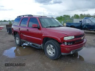 2005 Chevrolet Tahoe Z71 with VIN 1GNEK13T05R150566, listed as a IAAI auction lot 42257236 with 295,315 mi miles and . Bid and sale history available at DreamBid. Image 1.