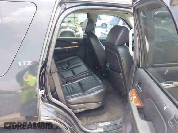 2008 Chevrolet Tahoe 3LT z VIN 1GNFC13088R137897, wystawiony jako IAAI lot #42644894 z przebiegiem 256 548 mil mil oraz . Historia ofert i sprzedaży dostępna na DreamBid. Obrazek 8.