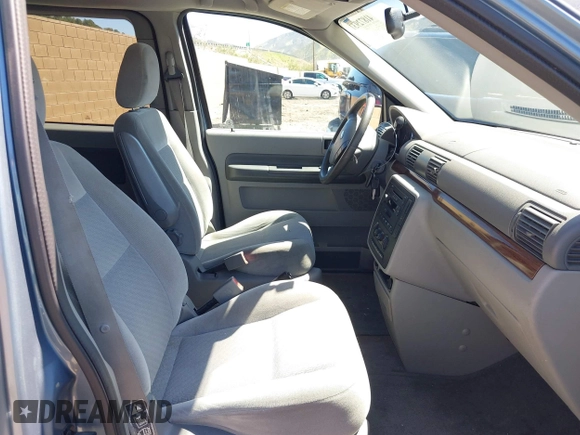 2004 Ford Freestar SEL z VIN 2FMDA52264BA43428, wystawiony jako IAAI lot #41872931 z przebiegiem 118 764 mil mil oraz . Historia ofert i sprzedaży dostępna na DreamBid. Obrazek 5.