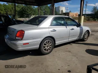2002 Hyundai XG L with VIN KMHFU45E52A162371, listed as a Copart auction lot 73469904 with 176,352 mi miles and Salvage Title. Bid and sale history available at carsss.com. Image 3.