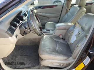 2002 Lexus ES 300 z VIN JTHBF30G620069802, wystawiony jako Copart lot #56731245 z przebiegiem 245 280 mil mil oraz Szkoda całkowita • Salvage title. Historia ofert i sprzedaży dostępna na DreamBid. Obrazek 7.