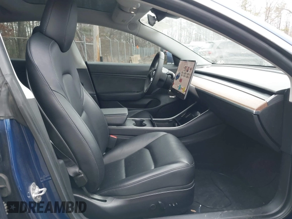 2019 Tesla Model 3 Long Range with VIN 5YJ3E1EB9KF454007, listed as a IAAI auction lot 41769346 with 141,609 mi miles. Bid and sale history available at carsss.com. Image 5.