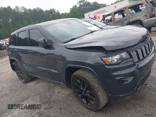 2018 Jeep Grand Cherokee Upland with VIN 1C4RJFAG4JC249243, listed as a IAAI auction lot 42291794 with 194,501 mi miles and . Bid and sale history available at DreamBid. Image 13.