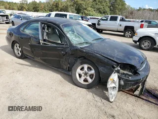 2000 Ford Taurus SE with VIN 1FAFP53U9YG285971, listed as a Copart auction lot 78138984 with 182,135 mi miles and Salvage Title. Bid and sale history available at DreamBid. Image 4.