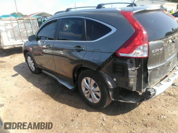 2012 Honda CR-V EX-L with VIN JHLRM4H70CC021165, listed as a IAAI auction lot 42023012 with 147,603 mi miles and . Bid and sale history available at DreamBid. Image 3.
