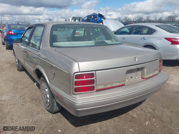 1996 Oldsmobile Ciera 1SA + VX5 with VIN 1G3AJ55MXT6328733, listed as a IAAI auction lot 41972783 with 182,525 mi miles. Bid and sale history available at carsss.com. Image 3.