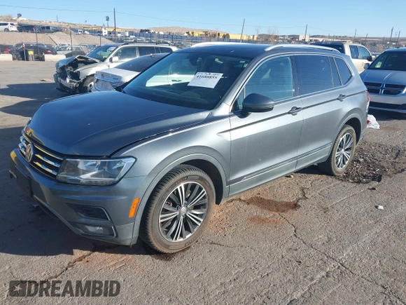 2018 Volkswagen Tiguan SEL z VIN 3VV3B7AXXJM088230, wystawiony jako IAAI lot #41680855 z przebiegiem 130 807 mil mil oraz . Historia ofert i sprzedaży dostępna na DreamBid. Obrazek 18.