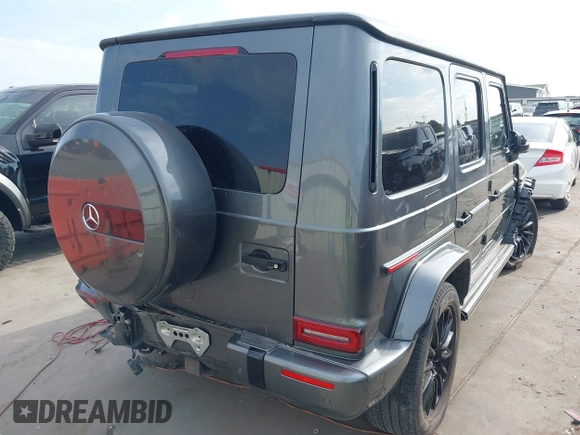 2021 Mercedes-Benz G 550 with VIN W1NYC6BJXMX382983, listed as a IAAI auction lot 42032687 with 22,835 mi miles and . Bid and sale history available at DreamBid. Image 4.