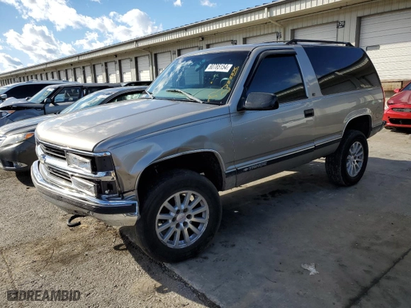 1999 Chevrolet Tahoe with VIN 3GNEK18R9XG152347, listed as a Copart auction lot 80785154 with 301,018 mi miles and Salvage Title. Bid and sale history available at carsss.com. Image 1.