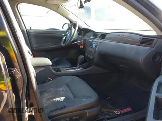 2012 Chevrolet Impala LTZ with VIN 2G1WC5E39C1280827, listed as a IAAI auction lot 41979470 with 153,669 mi miles and . Bid and sale history available at DreamBid. Image 5.