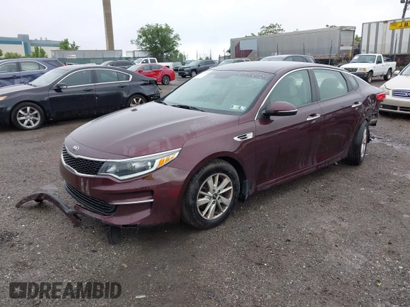 2016 Kia Optima LX with VIN 5XXGT4L31GG053429, listed as a IAAI auction lot 42464513 with 122,397 mi miles and . Bid and sale history available at DreamBid. Image 2.