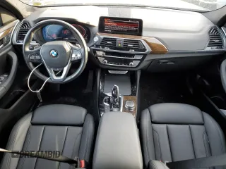 2020 BMW X4 xDrive30i z VIN 5UX2V1C02LLE67937, wystawiony jako Copart lot #70302802 z przebiegiem 30 553 mil mil oraz . Historia ofert i sprzedaży dostępna na DreamBid. Obrazek 8.