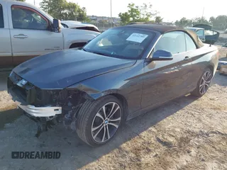 2020 BMW 2 Series 230i xDrive with VIN WBA2K1C08L7G28887, listed as a IAAI auction lot 42122785 with 30,599 mi miles and . Bid and sale history available at carsss.com. Image 2.