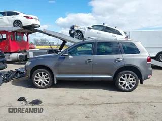 2010 Volkswagen Touareg VR6 with VIN WVGBF7A96AD002466, listed as a IAAI auction lot 41709052 with 204,819 mi miles and . Bid and sale history available at DreamBid. Image 14.