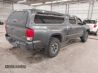 2016 Toyota Tacoma SR5 with VIN 3TMDZ5BN0GM012248, listed as a IAAI auction lot 41215908 with 170,756 mi miles and . Bid and sale history available at DreamBid. Image 4.