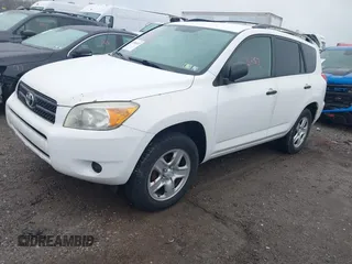 2006 Toyota RAV4 with VIN JTMBD33VX65015543, listed as a IAAI auction lot 41986857 with 124,709 mi miles. Bid and sale history available at carsss.com. Image 2.
