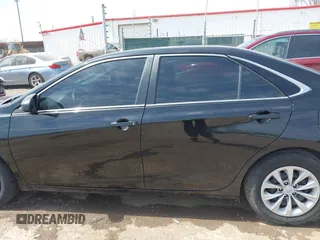 2016 Toyota Camry XLE with VIN 4T4BF1FK0GR581297, listed as a IAAI auction lot 42059507 with 151,777 mi miles. Bid and sale history available at carsss.com. Image 15.