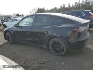 2024 Tesla Model Y Long Range with VIN 7SAYGDEE0RF034080, listed as a Copart auction lot 48329125 with 33,448 mi miles and Salvage Title. Bid and sale history available at carsss.com. Image 2.