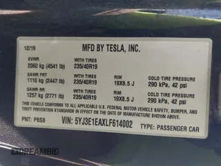 2020 Tesla Model 3 Standard Range Plus with VIN 5YJ3E1EAXLF614002, listed as a IAAI auction lot 41758898 with 42,363 mi miles and . Bid and sale history available at DreamBid. Image 9.