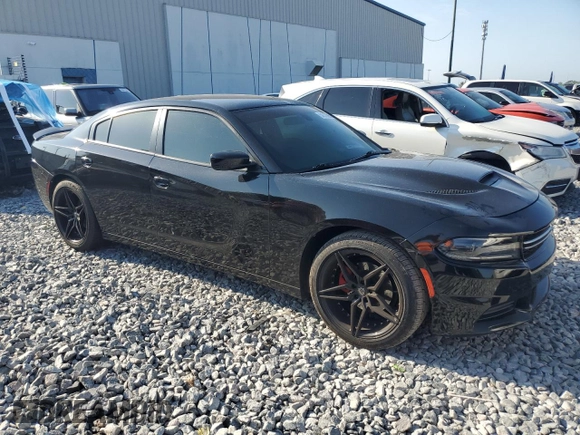 2019 Dodge Charger SXT with VIN 2C3CDXBG1KH697184, listed as a Copart auction lot 54313085 with 108,518 mi miles and Clean Title. Bid and sale history available at carsss.com. Image 4.