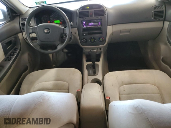 2005 Kia Spectra LX with VIN KNAFE121955160165, listed as a Copart auction lot 74695764 with 160,670 mi miles and Salvage Title. Bid and sale history available at carsss.com. Image 8.