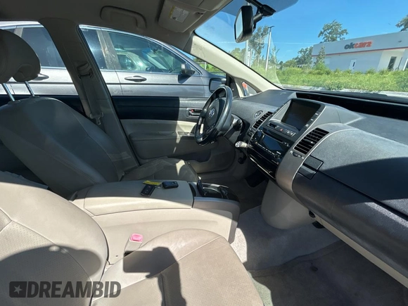 2007 Toyota Prius z VIN JTDKB20U477546822, wystawiony jako Copart lot #61691805 z przebiegiem 146 754 mil mil oraz Czysty tytuł • Clean title. Historia ofert i sprzedaży dostępna na DreamBid. Obrazek 5.