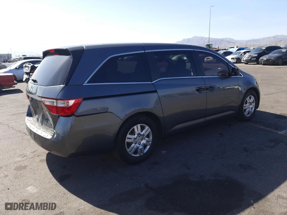 2012 Honda Odyssey LX with VIN 5FNRL5H24CB019934, listed as a Copart auction lot 52412605 with 157,725 mi miles and Salvage Title. Bid and sale history available at carsss.com. Image 3.