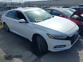2020 Honda Accord Touring with VIN 1HGCV3F97LA002043, listed as a IAAI auction lot 41666307 with 57,582 mi miles and . Bid and sale history available at DreamBid. Image 1.