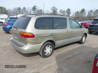 2000 Toyota Sienna LE z VIN 4T3ZF13C1YU211572, wystawiony jako IAAI lot #41724715 z przebiegiem 265 622 mil mil oraz . Historia ofert i sprzedaży dostępna na DreamBid. Obrazek 4.