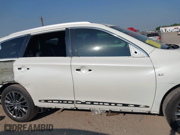 2020 Infiniti QX60 Luxe z VIN 5N1DL0MN7LC525683, wystawiony jako IAAI lot #42022763 z przebiegiem 70 575 mil mil oraz . Historia ofert i sprzedaży dostępna na DreamBid. Obrazek 13.