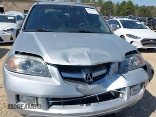 2005 Acura MDX with VIN 2HNYD18265H557625, listed as a IAAI auction lot 41898001 with 192,544 mi miles. Bid and sale history available at carsss.com. Image 6.