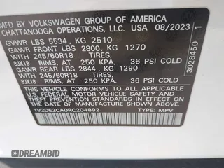 2024 Volkswagen Atlas SE with VIN 1V2DE2CA0RC204892, listed as a IAAI auction lot 41705913 with 12,337 mi miles and . Bid and sale history available at DreamBid. Image 9.