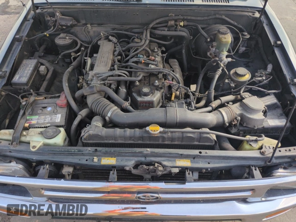 1994 Toyota Pickup DX with VIN JT4RN81PXR5174113, listed as a Copart auction lot 64211905 with 209,694 mi miles and Salvage title. Bid and sale history available at DreamBid. Image 11.