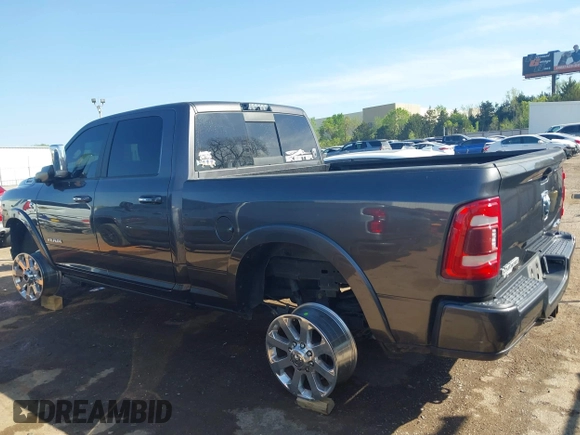 2020 Ram 2500 Laramie z VIN 3C6UR5FL0LG230960, wystawiony jako IAAI lot #42029886 z przebiegiem 61 544 mil mil oraz . Historia ofert i sprzedaży dostępna na DreamBid. Obrazek 13.
