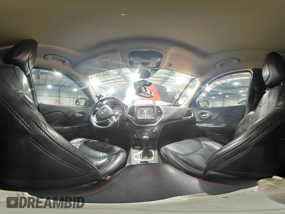 2015 Jeep Cherokee Trailhawk with VIN 1C4PJMBS5FW587545, listed as a Copart auction lot 58820685 with 136,755 mi miles and Salvage title. Bid and sale history available at DreamBid. Image 15.