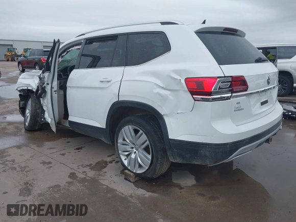 2019 Volkswagen Atlas SE z VIN 1V2WR2CA9KC593891, wystawiony jako IAAI lot #41947078 z przebiegiem 74 525 mil mil oraz . Historia ofert i sprzedaży dostępna na DreamBid. Obrazek 3.