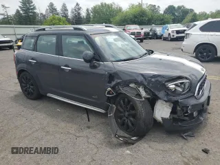 2019 MINI Countryman Cooper S with VIN WMZYT5C57K3E62624, listed as a Copart auction lot 59481905 with 98,182 mi miles and Salvage title. Bid and sale history available at DreamBid. Image 4.
