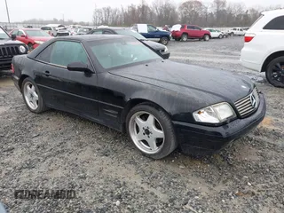 2001 Mercedes-Benz SL-Class with VIN WDBFA68F31F197102, listed as a IAAI auction lot 41666252 with 145,523 mi miles. Bid and sale history available at carsss.com. Image 1.