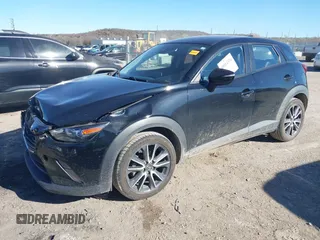 2018 Mazda CX-3 Touring with VIN JM1DKDC70J0325325, listed as a IAAI auction lot 40914334 with 63,978 mi miles. Bid and sale history available at carsss.com. Image 17.